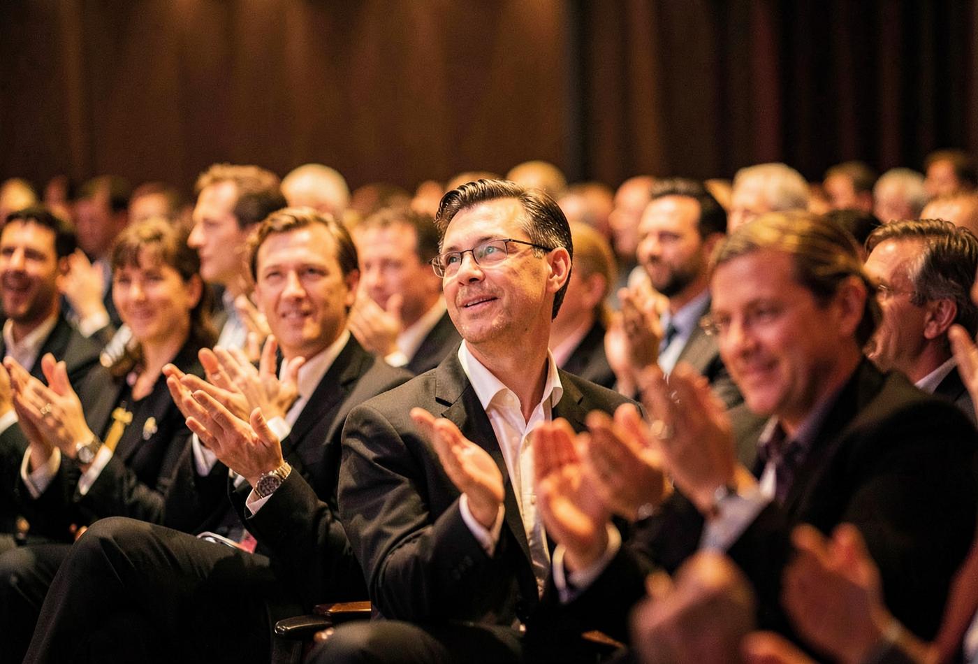 Audience listening inside the auditorium